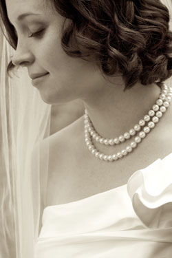 bride profile with classic pearls