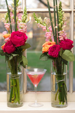 cosmo cocktail with bouquets in flower vases