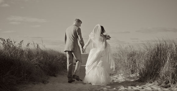 wedding bride groom walking beach